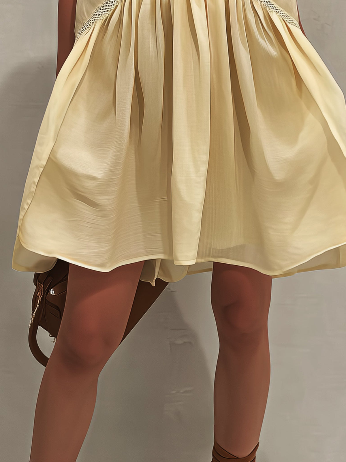Yellow Sleeveless Mini Dress with Deep V-Neck and Lace Details