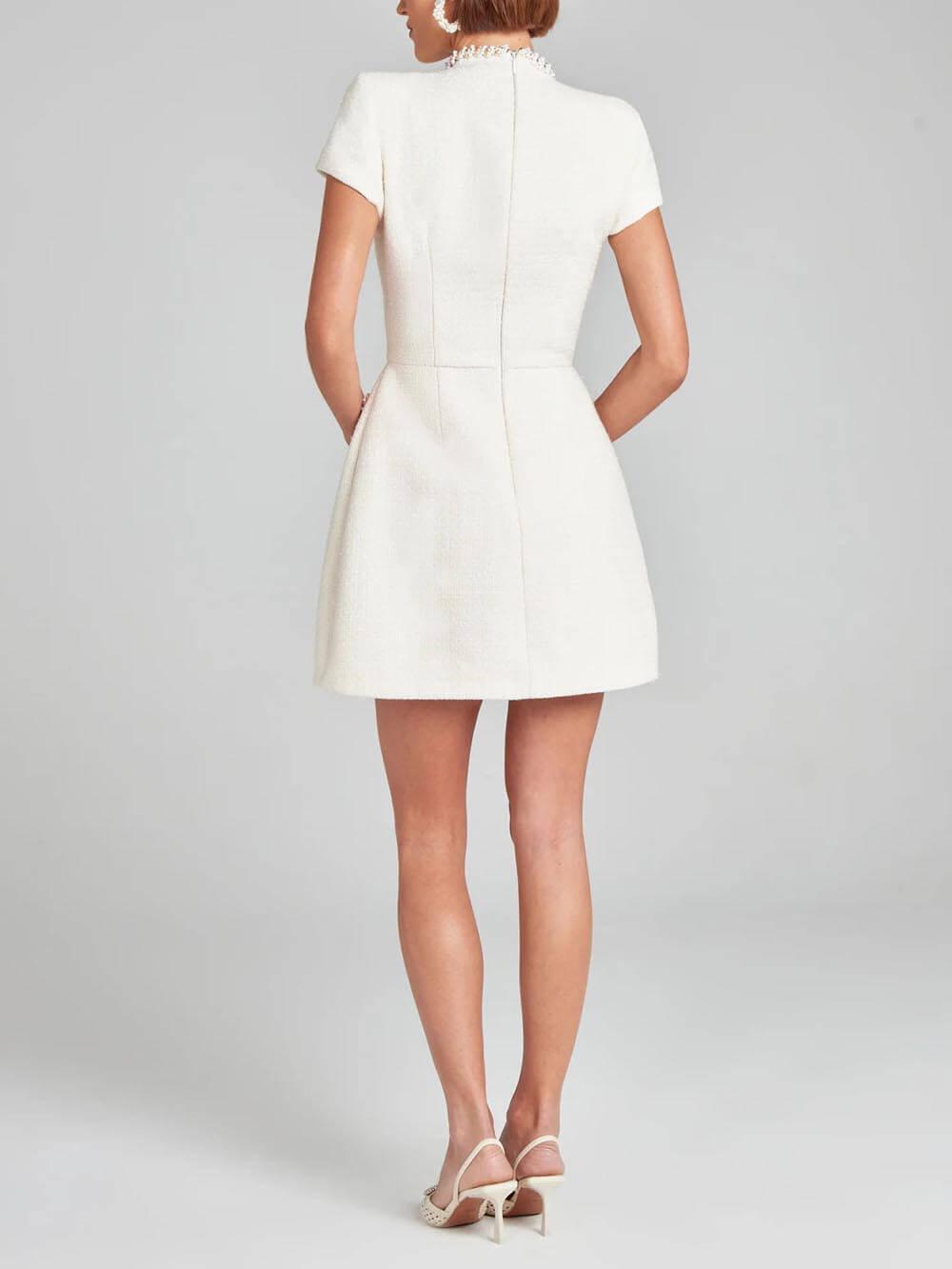 Mini Dress with Pockets and Pearl Trim, Elegant and Playful