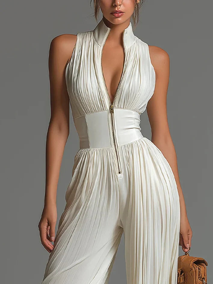 White sleeveless chiffon jumpsuit with V-neck, zipper, and wide pleated pants